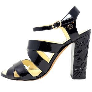 CHANEL Black and Gold Heels with Sculptural Design